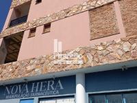 Casa com área Comercial e Terreno
